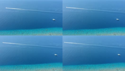 乘船穿越美丽的蓝绿色海水高清在线视频素材下载