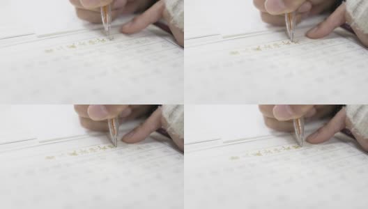 亚洲女性，用中性笔抄写佛经高清在线视频素材下载