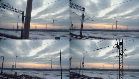 从火车经过风车在日落慢镜头4k高清在线视频素材下载