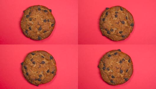 巧克力饼干近景，微距拍摄，缓慢旋转的红色背景。高清在线视频素材下载