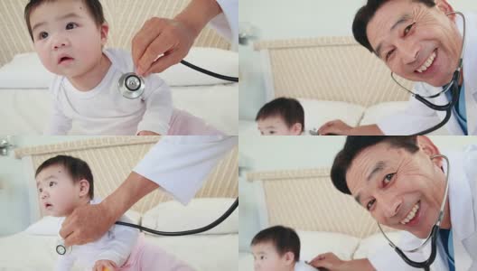 医生在床上检查婴儿高清在线视频素材下载