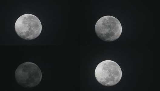 满月在多云的天空，夜间飞行云的高清镜头。高清在线视频素材下载
