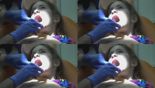 牙科门诊看专科的幼儿病人。牙科治疗高清在线视频素材下载