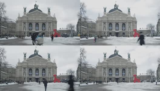 乌克兰利沃夫——2018年冬季:乌克兰老城利沃夫下雪寒冷的天气。人们走在利沃夫歌剧院和芭蕾舞剧院附近的街道上。高清在线视频素材下载