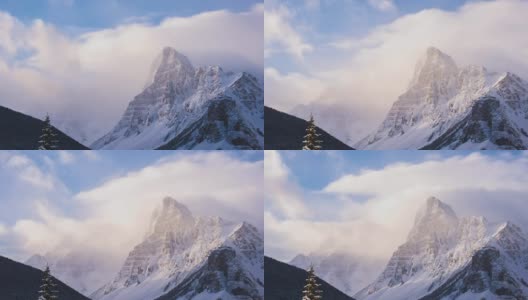日出时，雪山山顶上的流云高清在线视频素材下载