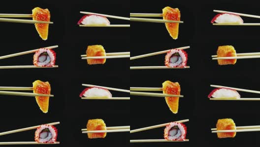 寿司质量高，打开黑色背景，显示其所有的好，饮食和健康的食物，美味的味道，寿司很好与鲑鱼或金枪鱼，是一个典型的日本食物高清在线视频素材下载