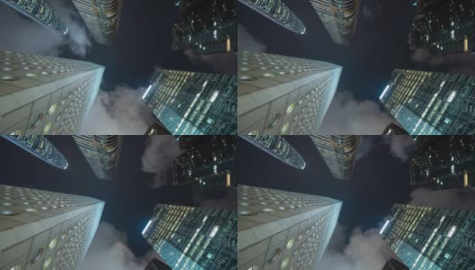 时间流逝的高层写字楼，摩天大楼，建筑在金融区。智慧城市为商业和科技的概念背景，在香港市中心的夜晚高清在线视频素材下载