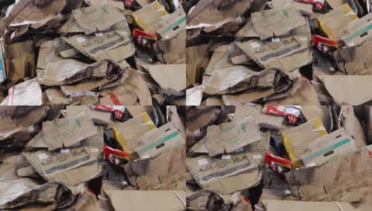 在垃圾处理工厂有可回收纸板箱的仓库高清在线视频素材下载