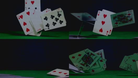 游戏牌掉在绿色的桌子上高清在线视频素材下载