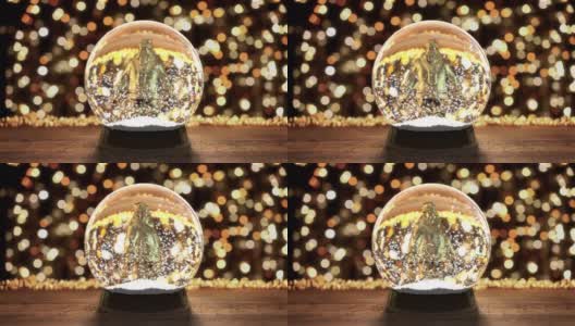 玻璃雪花球与飞舞的雪花背景圣诞灯高清在线视频素材下载