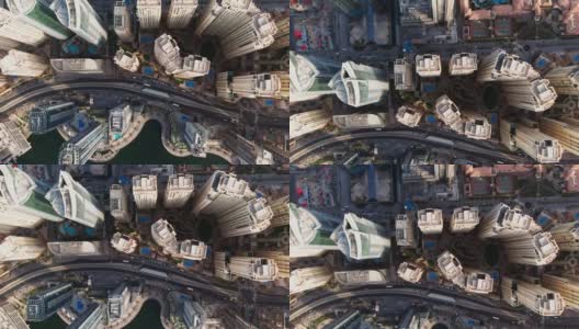 迪拜城市的俯视图。无人机飞过迪拜码头的摩天大楼和海滩高清在线视频素材下载