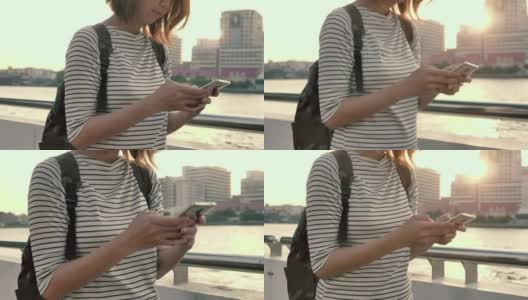 智能手机的女孩在户外高清在线视频素材下载