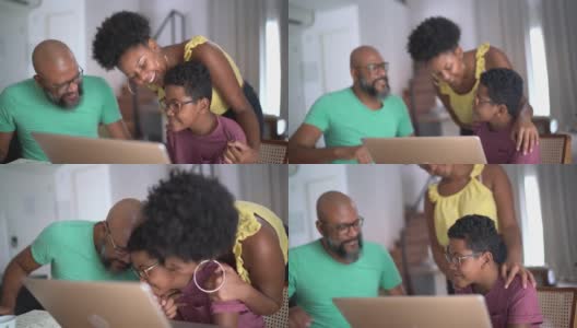 父亲和女儿祝贺男孩在家上学高清在线视频素材下载