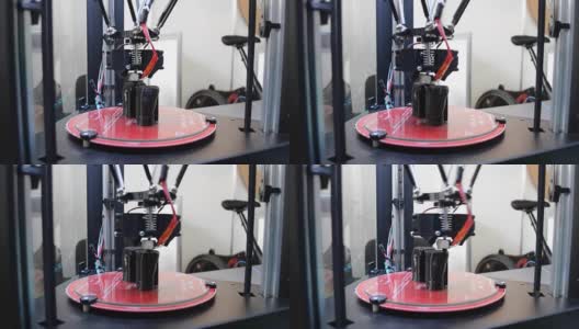 3D打印机工作和创建一个对象从热熔融塑料高清在线视频素材下载