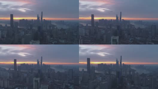 黎明的上海天际线。全景俯瞰图。中国无人机向后飞行。远景。高清在线视频素材下载