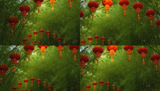 一排排传统中国风格的红灯笼挂在竹树隧道拱门上。高清在线视频素材下载
