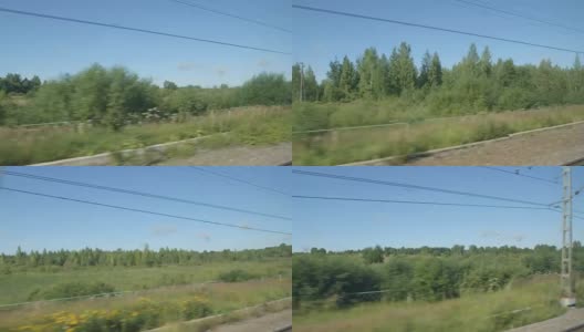 在夏天，高速列车快速驶过一片田野和小树高清在线视频素材下载