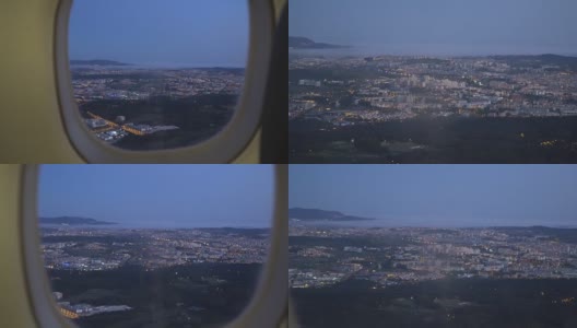 日落时从城市窗口降落的飞机上看到的景象高清在线视频素材下载