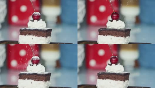在美味的蛋糕上撒糖粉，超级慢镜头高清在线视频素材下载