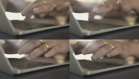 女人在笔记本电脑键盘上打字，特写高清在线视频素材下载