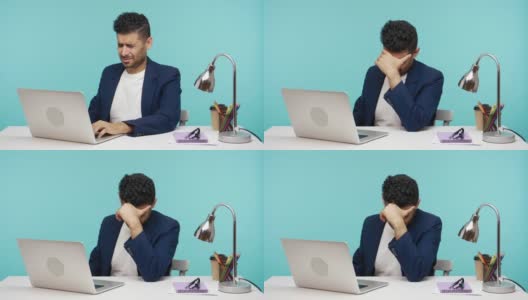 穿着西装的疲惫男人在办公室里用笔记本电脑工作，感觉无望和绝望，精神崩溃高清在线视频素材下载