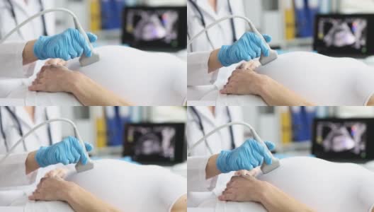 医生在门诊对孕妇做胎儿超声特写4k电影慢动作高清在线视频素材下载