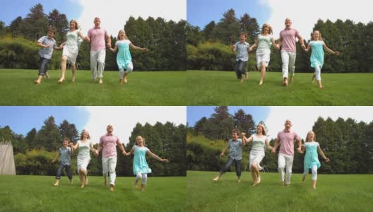 HD超级慢动作:快乐家庭在草坪上奔跑高清在线视频素材下载