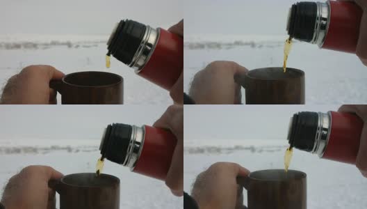 滑雪道上的热茶和大咖啡杯高清在线视频素材下载