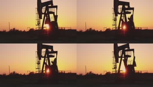 日落时分的油井抽油机高清在线视频素材下载