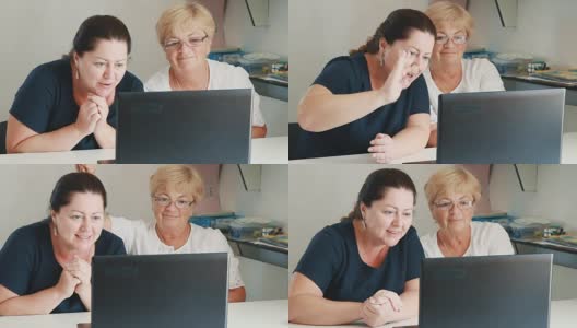 两个女人在笔记本电脑上通过skype聊天高清在线视频素材下载