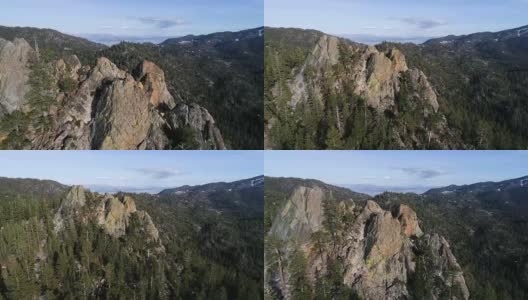 后退从山顶-内华达山脉无人机查看太浩湖，加利福尼亚州高清在线视频素材下载