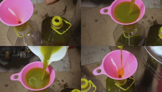 倒上新鲜制成的橄榄油——橄榄油磨高清在线视频素材下载