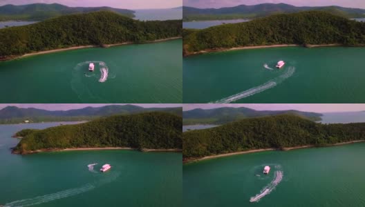 无人机拍摄的水上摩托在泰国芭堤雅豪华游艇上盘旋高清在线视频素材下载