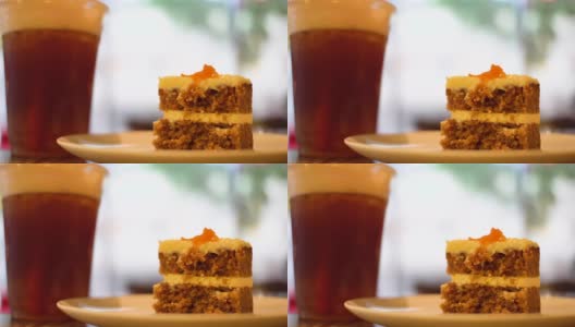 咖啡厅的胡萝卜蛋糕冰水果茶高清在线视频素材下载