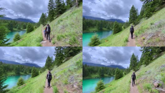 家庭徒步旅行在山谷的五湖步道，贾斯珀，加拿大高清在线视频素材下载