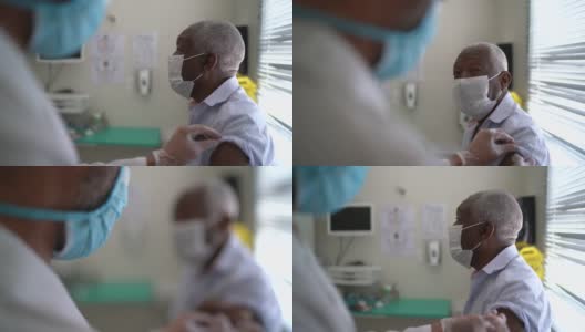 护士在病人手臂上接种疫苗高清在线视频素材下载