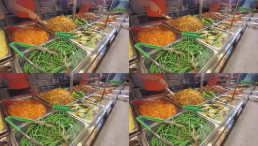 一个繁忙的中国和泰国快餐亚洲餐厅，位于一个繁忙的市中心购物中心的美食广场高清在线视频素材下载
