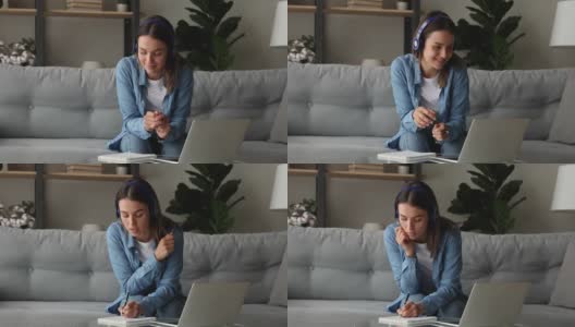 女人用笔记本电脑和家教聊天，在抄写本上做笔记高清在线视频素材下载