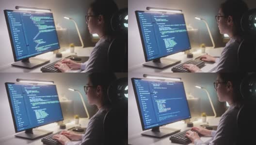 开发人员程序员在晚上工作在计算机代码高清在线视频素材下载