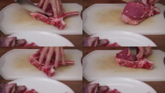 肉类准备-厨师从t骨牛排中剔骨高清在线视频素材下载