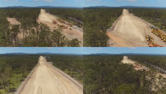 航拍:在多车道高速公路建筑工地上空近距离飞行高清在线视频素材下载