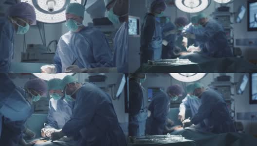 医疗队在现代手术室进行外科手术高清在线视频素材下载