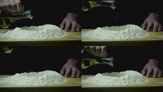 慢动作将橄榄油倒入面粉中高清在线视频素材下载