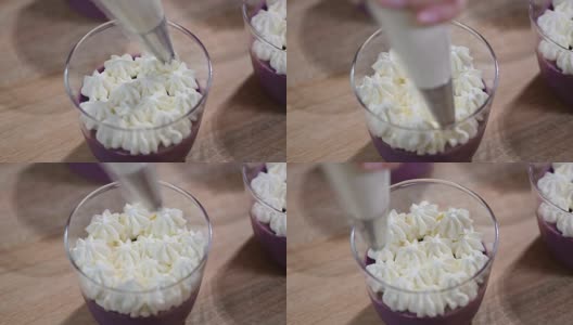 用鲜奶油装饰意式奶冻。用糕点袋挤奶油高清在线视频素材下载