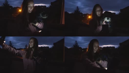 微笑可爱的女人与她的狗自拍高清在线视频素材下载