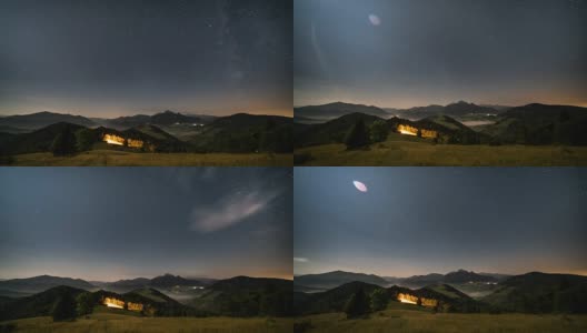 在月光下，星星在山峦和朦胧的乡村景色的夜空中移动。从黑夜到白天的时间流逝摄影车拍摄高清在线视频素材下载