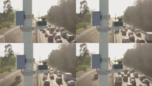 高速公路上的交通监控摄像头，监控违章行为，交通堵塞高清在线视频素材下载