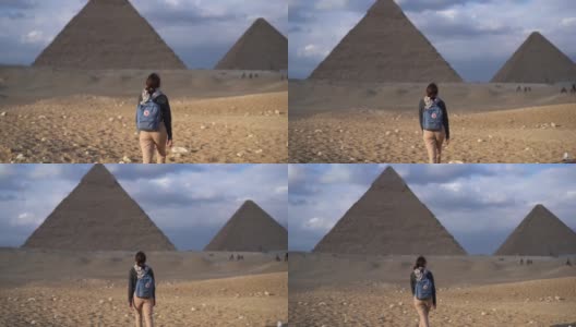 站在吉萨金字塔附近的女人高清在线视频素材下载