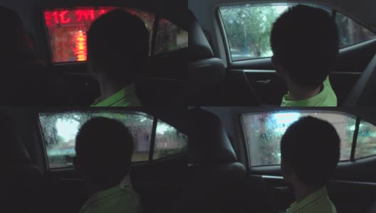 坐在车里看外面的亚洲男孩高清在线视频素材下载