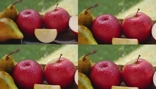 新鲜的苹果和梨与水滴高清在线视频素材下载